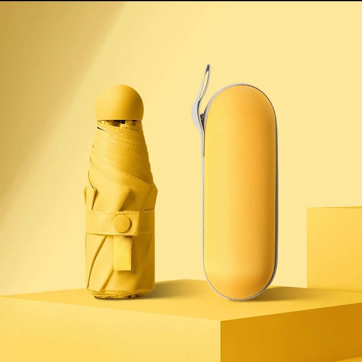 چتر جیبی کپسول دار SPF 50 ضد باد باران و آفتاب کمجا سبک مسافرتی