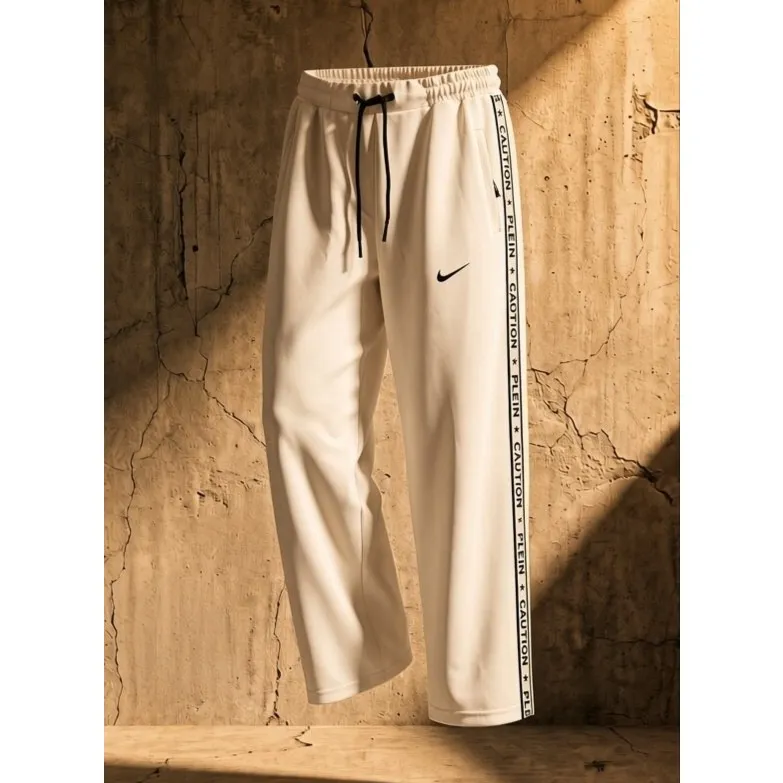 شلوار نیم بگ زنانه نایک نوار شبرنگ دار کرم روشن جنس مازراتی سایز 40 تا 44